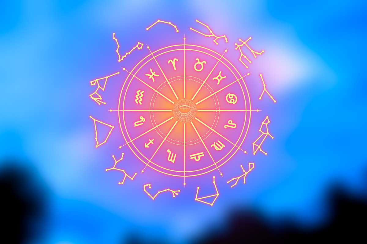 Boğa Dolunayı'nın 12 burca etkilerini temsil eden astroloji çarkı ve burç sembolleri